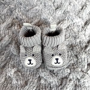 Knitted newborn slippers